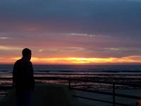 Kevin's watches Rota sunset from our balcony