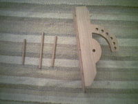 Bracket that holds the top and pins to hold the stand together.